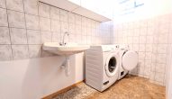 Perfektes Einfamilienhaus mit Garten und Garage - Hauswirtschaftsraum