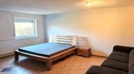 Schönes Einfamilienhaus mit Einliegerwohnung, Doppelgarage und Garten in Illerich, nahe Cochem - Zimmer UG