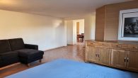 Schönes Einfamilienhaus mit Einliegerwohnung, Doppelgarage und Garten in Illerich, nahe Cochem - Wohnzimmer UG