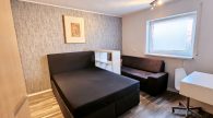 Schönes Einfamilienhaus mit Einliegerwohnung, Doppelgarage und Garten in Illerich, nahe Cochem - Zimmer UG