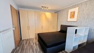 Schönes Einfamilienhaus mit Einliegerwohnung, Doppelgarage und Garten in Illerich, nahe Cochem - Zimmer UG