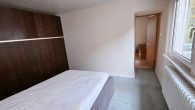 Großzügiges Einfamilienhaus mit 2 Garagen, Nebengebäude und Garten in Ortsrandlage von Zell/Mosel - Zimmer